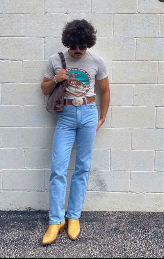 Graphic Tee with Light Blue Jeans and cowboy Boots